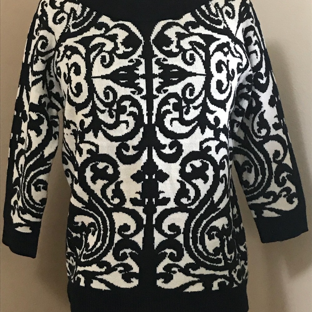 Soft sweater. 3/4 length sleeves.